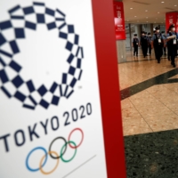 The Refugee Olympic Team has delayed its departure to Japan after an official with the delegation tested positive for COVID-19. | REUTERS