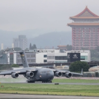 A U.S. Air Force C-17 Globemaster III carrying U.S. senators arrives at Songshan Airport in Taipei on June 6.   | POOL / VIA REUTERS