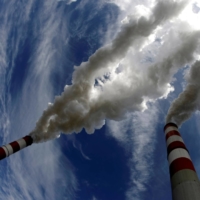 The Belchatow Power Station, Europe\'s biggest coal-fired power plant, in May 2009. Although it accounts for just 8% of the world\'s greenhouse gas emissions itself, the EU hopes it can use its clout as the world\'s biggest consumer market to set the climate agenda. | REUTERS
