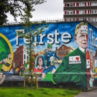 A mural in a Catholic area of Belfast | BLOOMBERG 