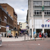 While bonfires are built and marches get under way, people are out shopping on a Friday afternoon like in any U.K. town or city. | BLOOMBERG 