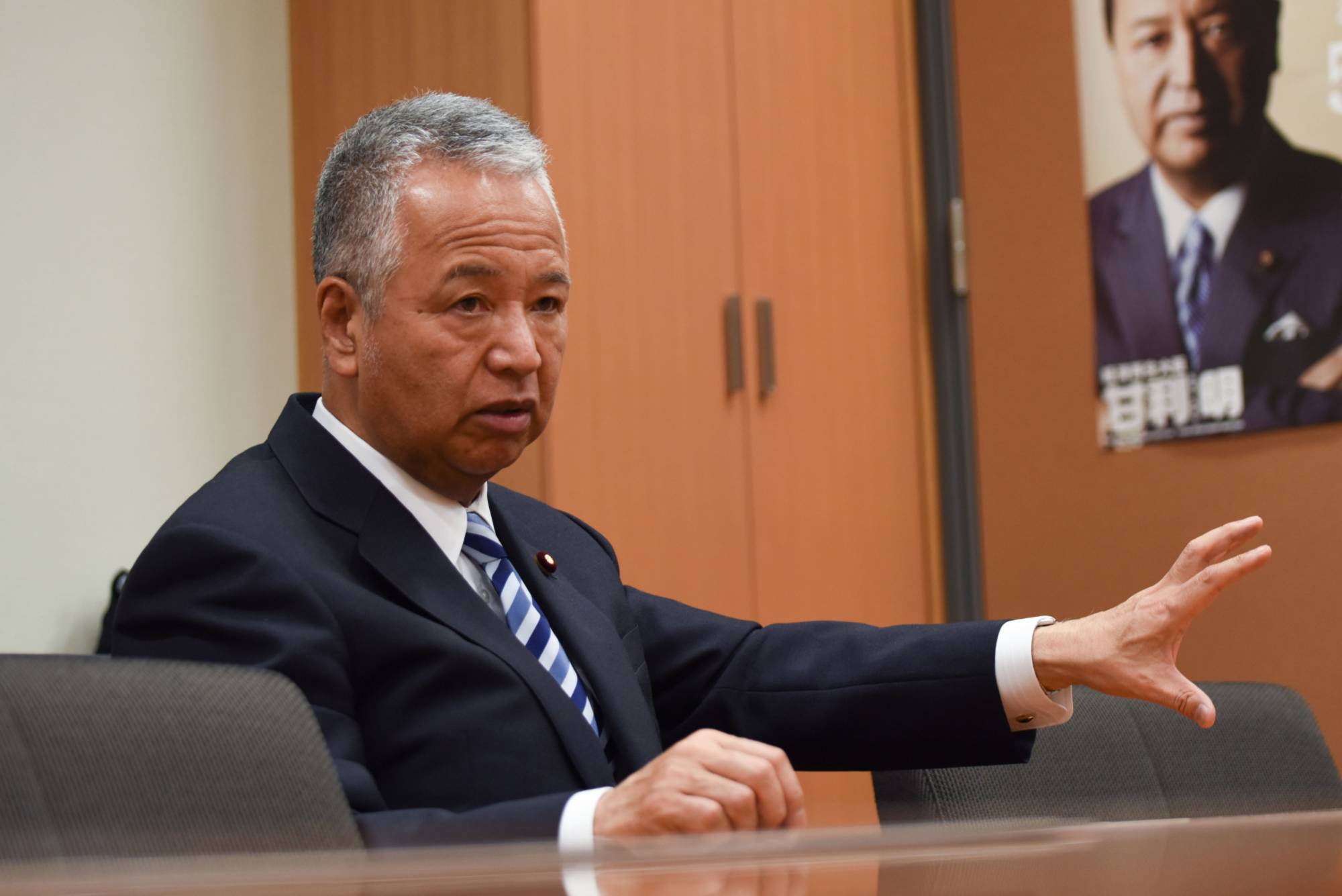 Akira Amari, tax chief of the ruling Liberal Democratic Party and former economy minister, says Japanese technology firms have been content to focus on the domestic market without venturing out into the world. | Bloomberg