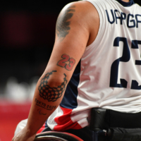 A Paralympic tattoo on the elbow of Raul Vega, a Columbian wheelchair basketball athlete | DAN ORLOWITZ