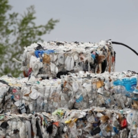 Bales of hard-to-recycle plastic waste are seen piled up at Renewlogy Technologies in Salt Lake City, Utah, on May 17. | REUTERS