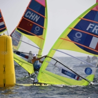 A scene from the men\'s windsurfer RS:X medal race sailing competition at the Enoshima Yacht Harbour in Fujisawa, Kanagawa Prefecture | AFP-JIJI