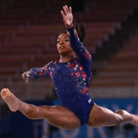 Simone Biles competes in the floor event of the artistic gymnastic women\'s qualification on July 25.  | AFP-JIJI