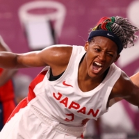 Stephanie Mawuli of Japan drives past a French defender during a quarterfinal match on Tuesday.  | REUTERS
