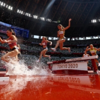 Luiza Gega of Albania, Gesa Felicitas Krause of Germany and Genevieve Gregson of Australia compete in the women\'s 3000-meter steeplechase on Sunday.  | REUTERS 
