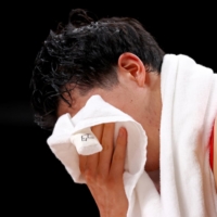Yuta Watanabe of Japan appears dejected after his team lost to Argentina on Sunday.  | REUTERS