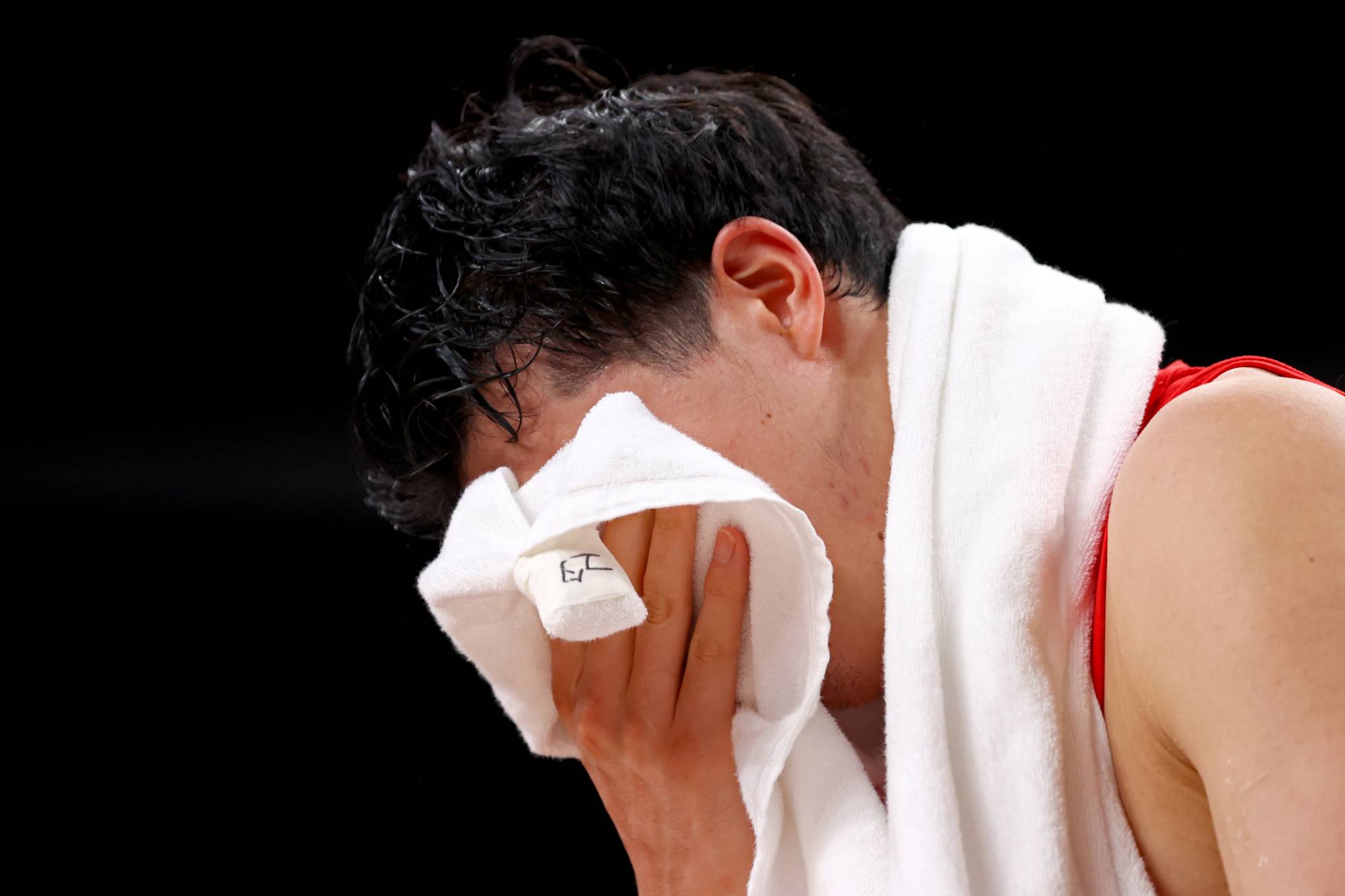 Yuta Watanabe of Japan appears dejected after his team lost to Argentina on Sunday. | Reuters