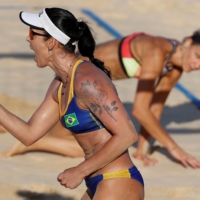 Brazil\'s Agatha Bednarczuk reacts during her team\'s game against Germany in the women\'s beach volleyball competition. | REUTERS