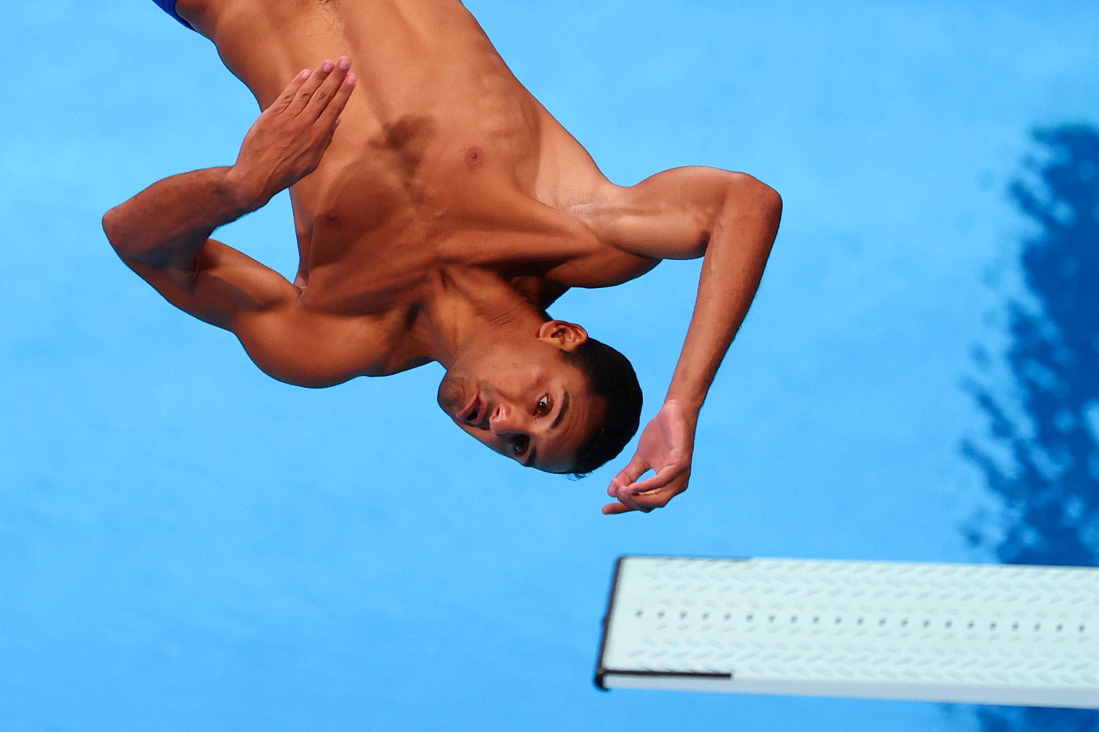 Egypt's Mohab Ishak in action during the preliminary round of the men's 3-meter springboard | REUTERS