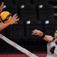 South Korea\'s Kim Hee-jin spikes the ball during a preliminary round of women\'s volleyball between Serbia and South Korea | AFP-JIJI