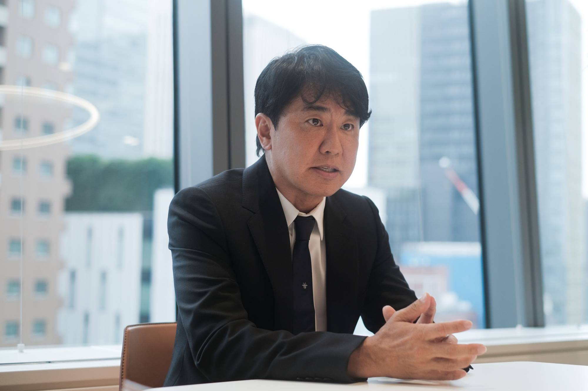 Kiyoshi Matsuura, president of Premier Anti-Aging Co., speaks in an interview. | BLOOMBERG