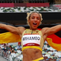 Malaika Mihambo of Germany celebrates after winning gold in the long jump.  | REUTERS