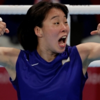 Sena Irie celebrates after winning the gold medal in the women\'s featherweight class.  | REUTERS