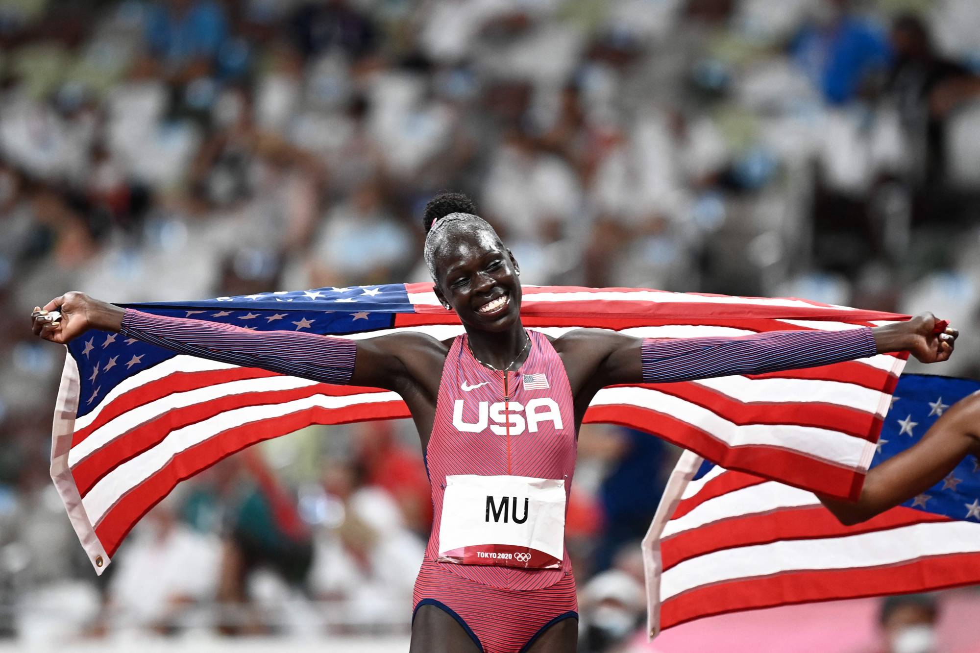 U.S.'s Athing Mu celebrates after winning gold in the women's 800-meter final | AFP-JIJI