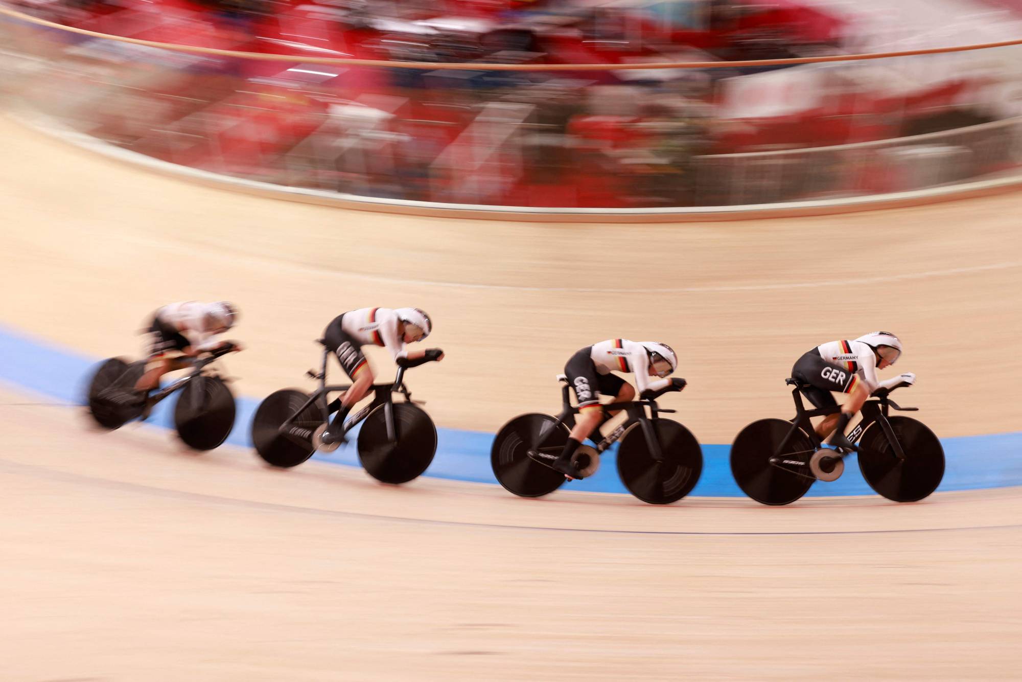 Germany's team compete to setting the new world record during the women's track cycling team pursuit finals | AFP-JIJI