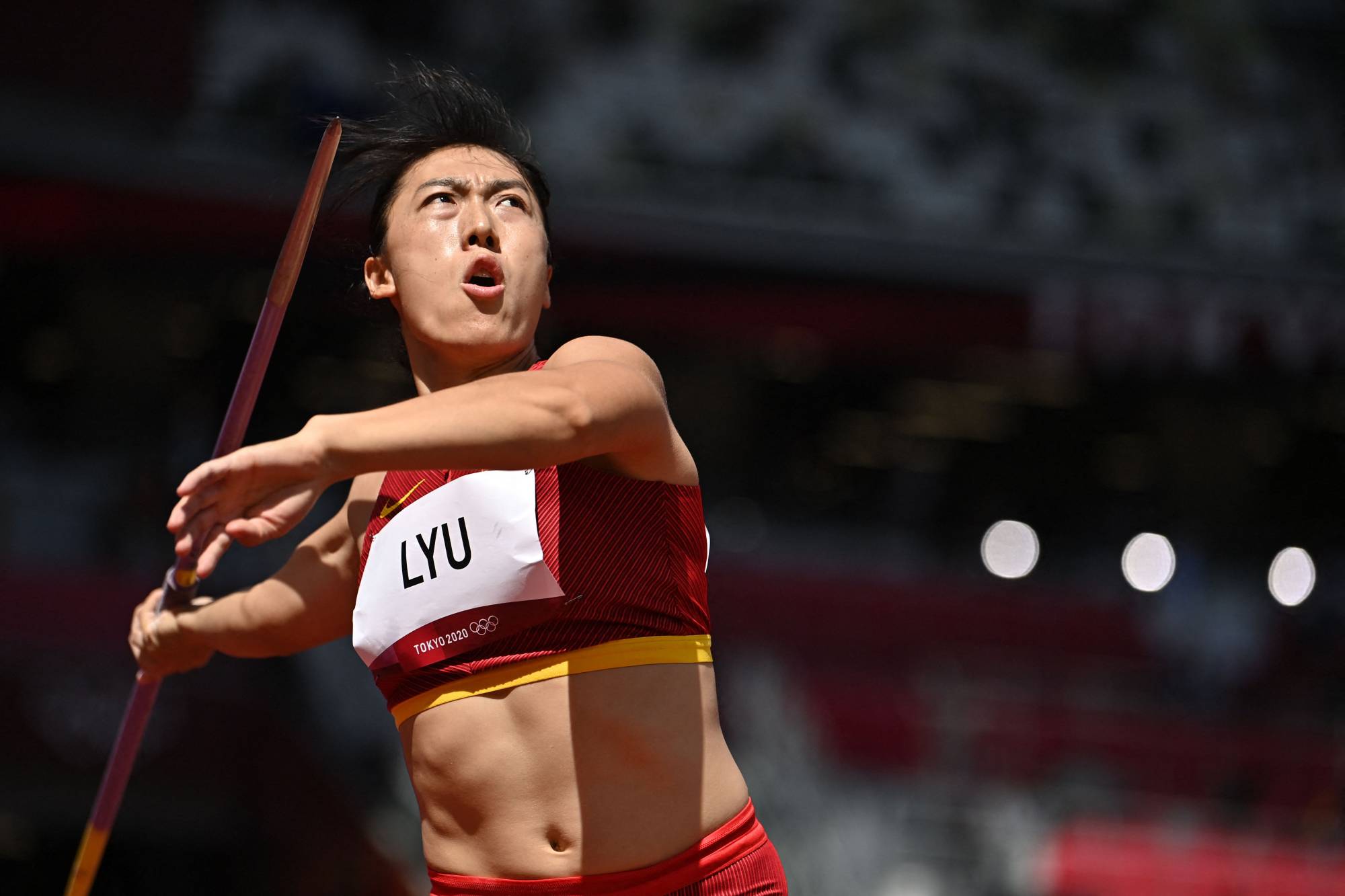 China's Lyu Huihui competes in the women's javelin throw qualification | AFP-JIJI
