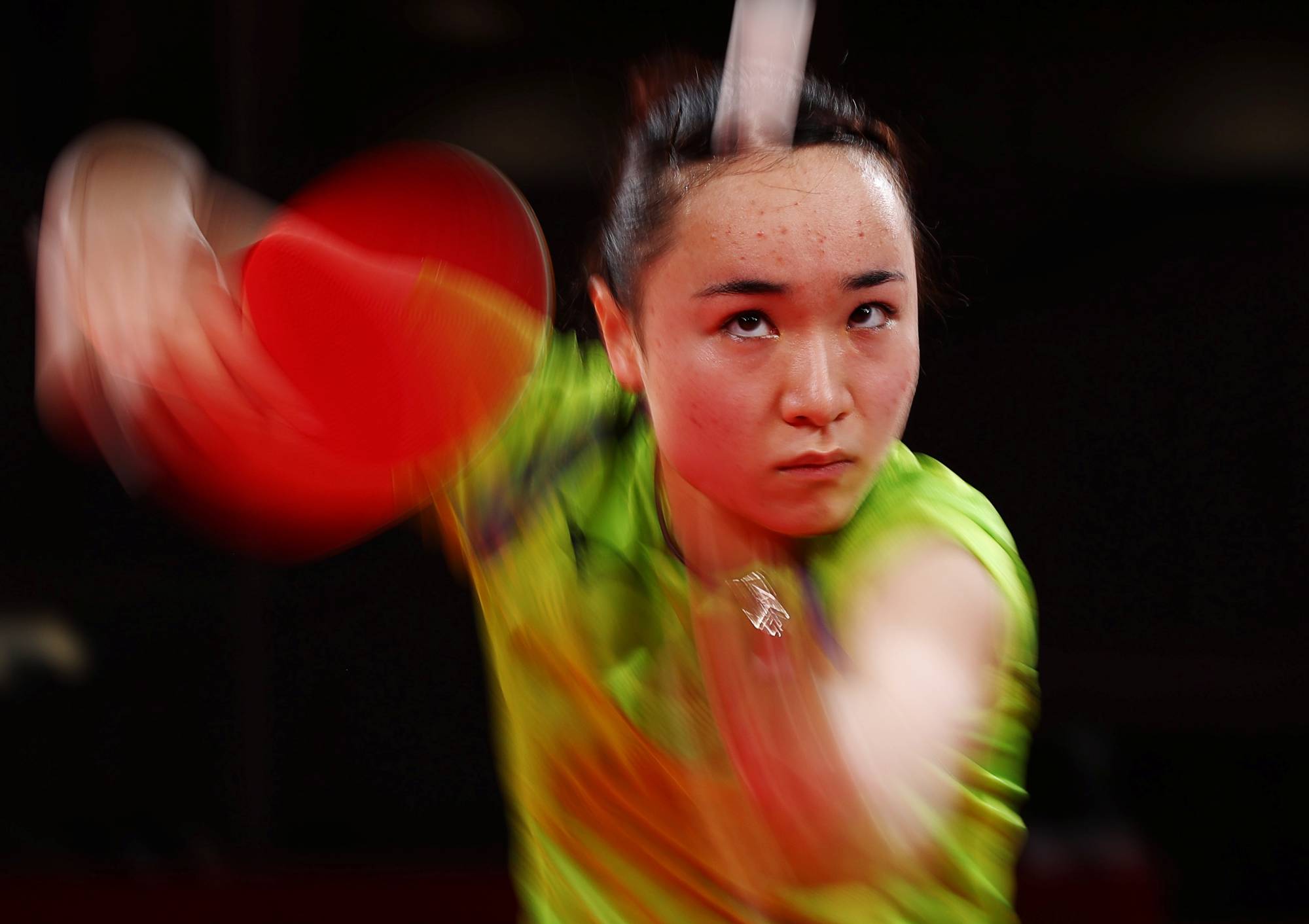Japan's Mima Ito in action against Hong Kong's Doo Hoi Kem during the women's team table tennis semifinal | REUTERS