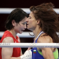 Stoyka Krasteva of Bulgaria (right) after winning her fight against Tsukimi Namiki of Japan on Wednesday.  | REUTERS 
