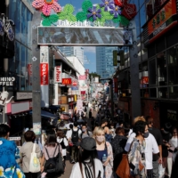 Crowds on the streets of Tokyo\'s Harajuku district on Saturday | REUTERS
