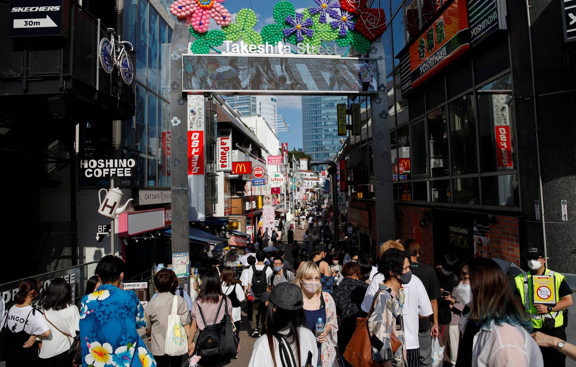 Crowds on the streets of Tokyo's Harajuku district on Saturday | REUTERS
