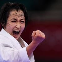 Kiyou Shimizu of Japan performs in the women\'s kata event on Thursday at Tokyo\'s Nippon Budokan.  | REUTERS