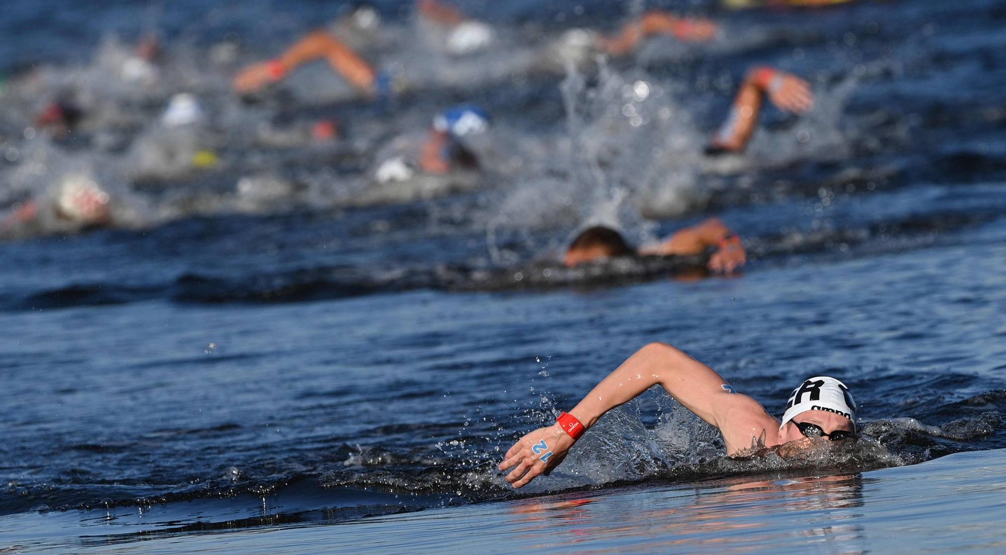 Germany's Florian Wellbrock swims in the lead in the men's 10-km marathon swimming event | AFP-JIJI