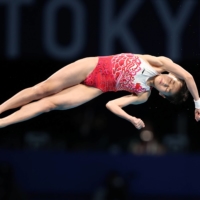 China\'s Quan Hongchan in action during the women\'s 10-meter platform. | REUTERS