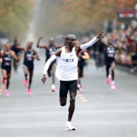 Kenya\'s Eliud Kipchoge, crosses the finish line during his attempt to run a marathon in under two hours in Vienna in October 2019.  | REUTERS