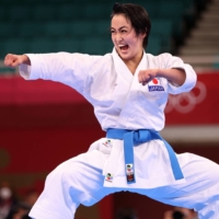 Kiyou Shimizu of Japan competes in the women\'s kata gold medal match on Thursday at Tokyo\'s Nippon Budokan.  | REUTERS