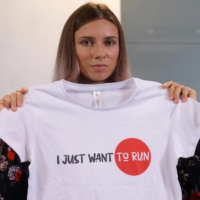 Belarusian Olympic athlete Krystsina Tsimanouskaya attends a news conference on Thursday in Warsaw, one day after her arrival in Poland.  | AFP-JIJI