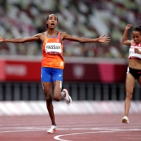 The Netherlands\' Sifan Hassan reacts after winning gold in the women\'s 10,000 meter on Saturday night. | REUTERS