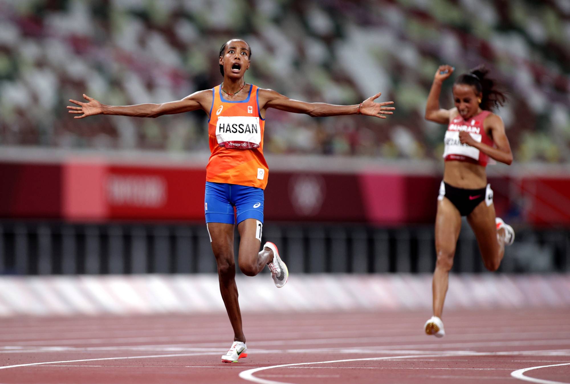 The Netherlands' Sifan Hassan reacts after winning gold in the women's 10,000 meter on Saturday night. | REUTERS