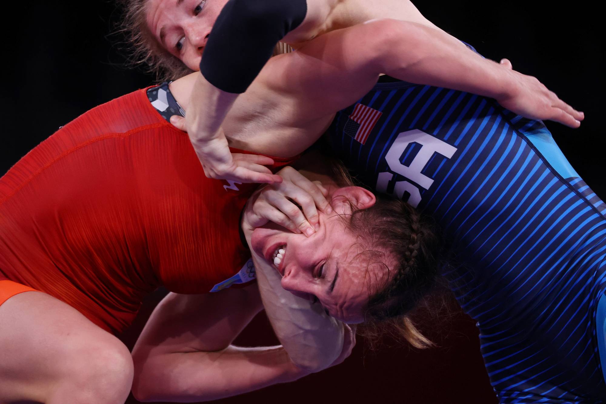 USA's Sarah Hildebrandt in action against Ukraine's Oksana Livach during the bronze medal match of women's 50-kg wrestling event. | REUTERS