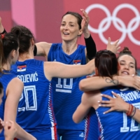 Serbia\'s Maja Ognjenovic (center) celebrates with teamnate Jelena Blagojevic (center left) after winning their women\'s Olympic bronze medal volleyball match against South Korea at Ariake Arena in Tokyo on Sunday. | AFP-JIJI
