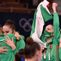 Team Bulgaria celebrates winning the group all-around final of the rhythmic gymnastics event  | AFP-JIJI