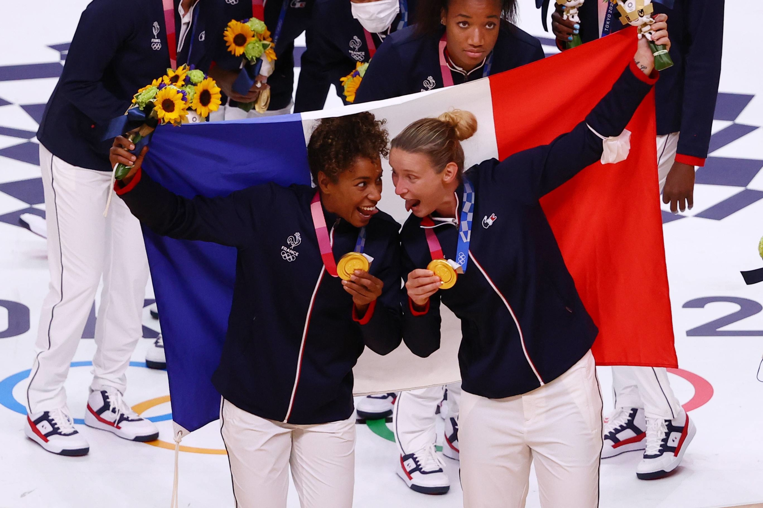 Gold medalist team members of France at the victory ceremony for women's volleyball. | REUTERS