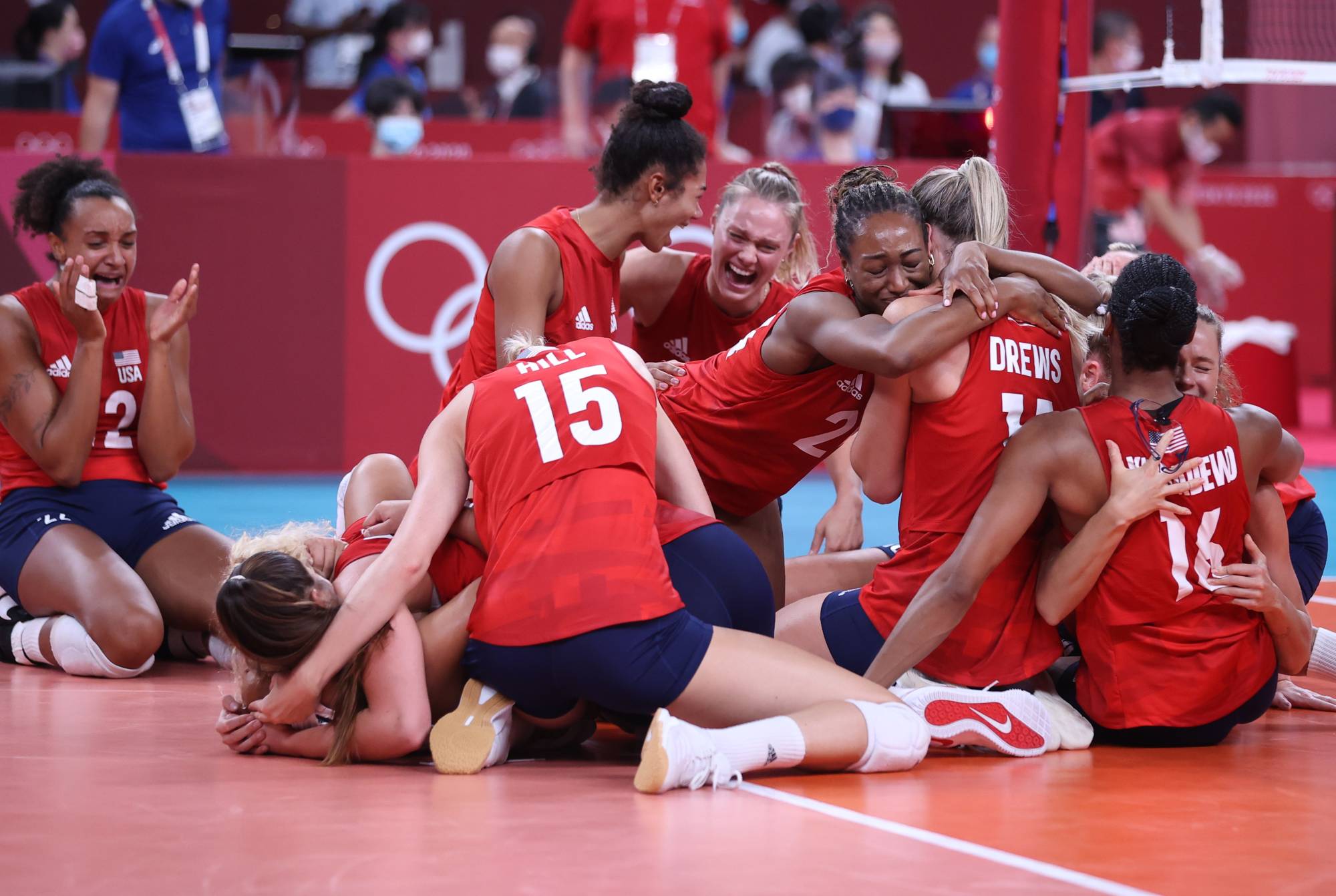 Members of USA's women's volleyball after winning their gold medal match against Brazil. | REUTERS