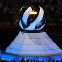The Olympic torch closes at the end of the closing ceremony. | REUTERS