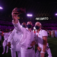 Athletes take a selfie during the closing ceremony  | POOL VIA REUTERS