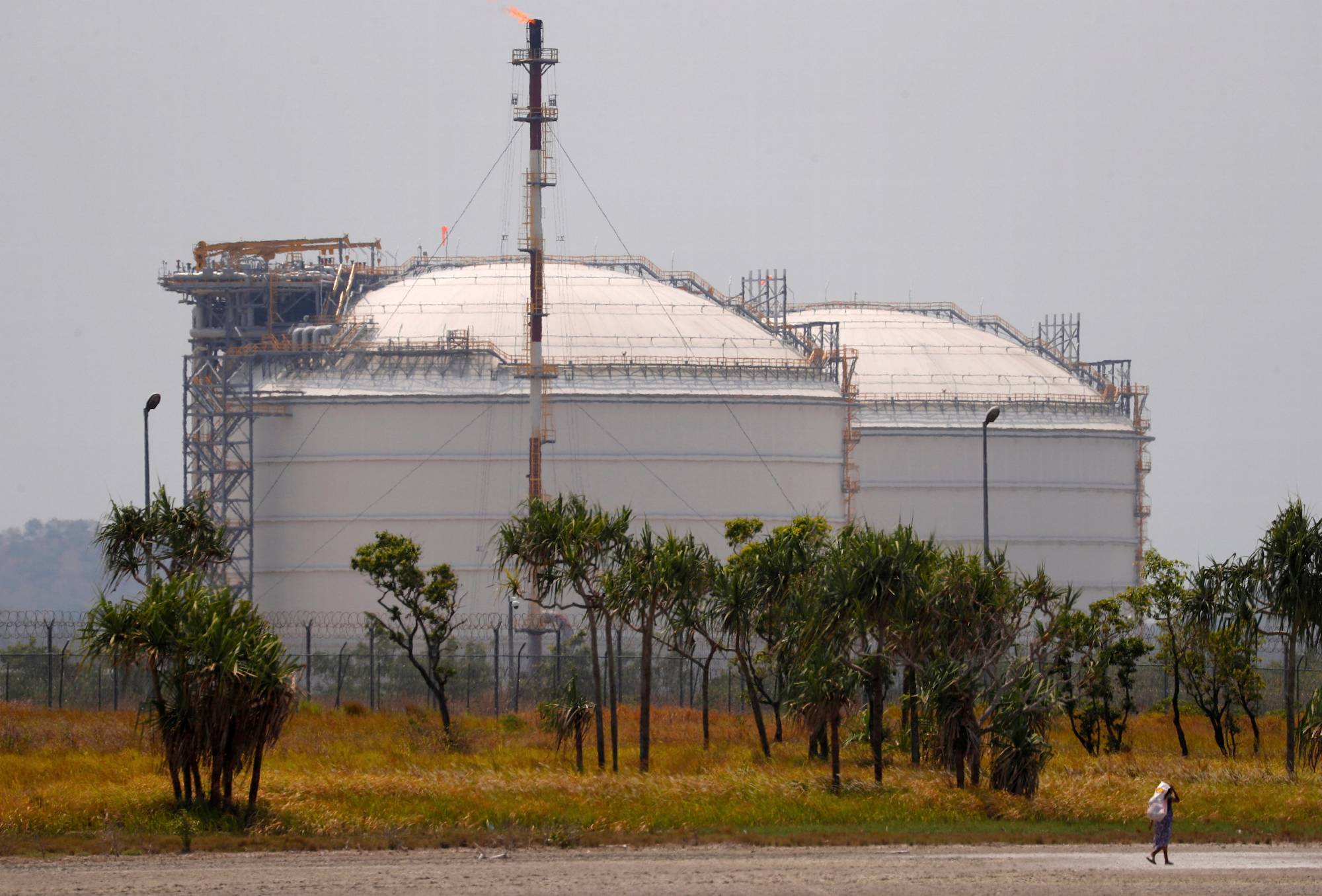 Liquefied natural gas storage tanks at an ExxonMobil PNG plant in Port Moresby, Papua New Guinea | Reuters 