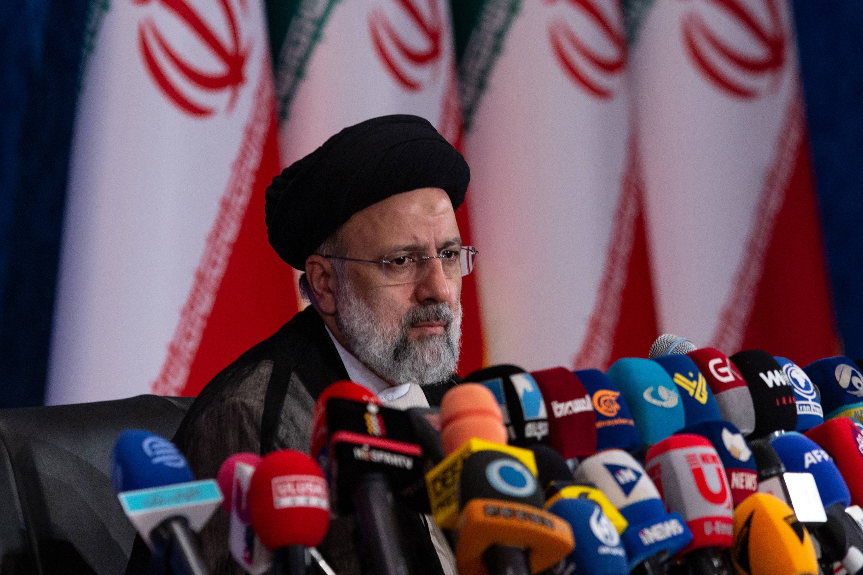 Ebrahim Raisi, then Iran's president-elect, speaks during a news conference in Tehran on June 21. | Arash Khamooshi / The New York Times