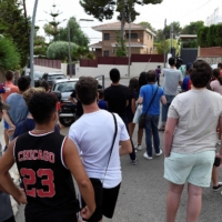 Fans gather outside the home of Lionel Messi in Barcelona on Monday.  | AFP-JIJI