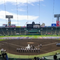 The opening ceremony of this summer\'s National High School Baseball Championship is held at Koshien Stadium in Nishinomiya, Hyogo Prefecture, on Tuesday. | KYODO
