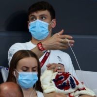 Gay British diver Tom Daley gained a social media following in Japan as much for his knitting as for his gold medal. | REUTERS