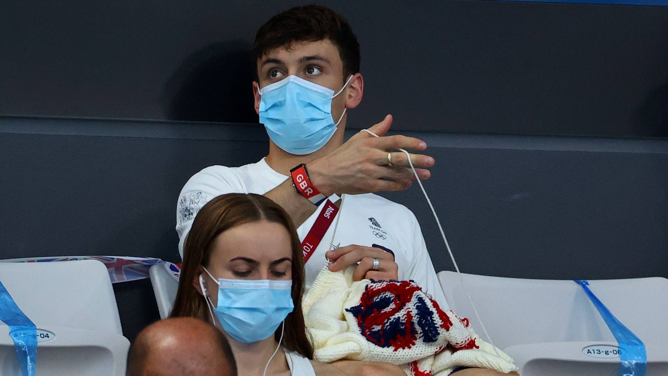 Gay British diver Tom Daley gained a social media following in Japan as much for his knitting as for his gold medal. | REUTERS