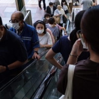 People in Tokyo\'s Shibuya district on Aug. 5 | AFP-JIJI