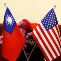 The flags of Taiwan and the U.S. | REUTERS